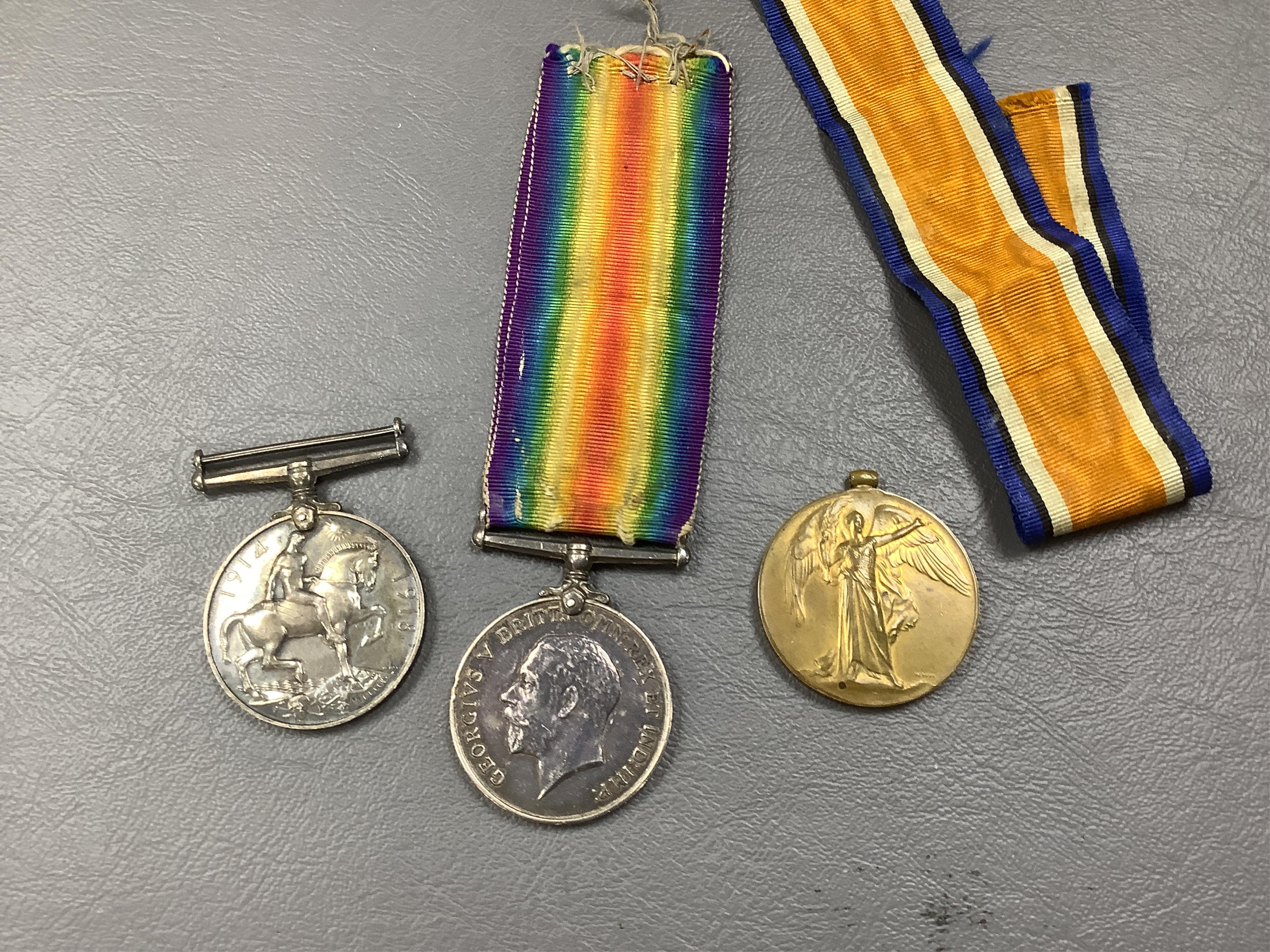 A quantity of assorted collectables, including a boxed Cartier handbag mirror, WWI medals, a plated belt, a Scottish silver and hardstone brooch, a silver hinged bangle, assorted costume jewellery, 925 bracelets, silver